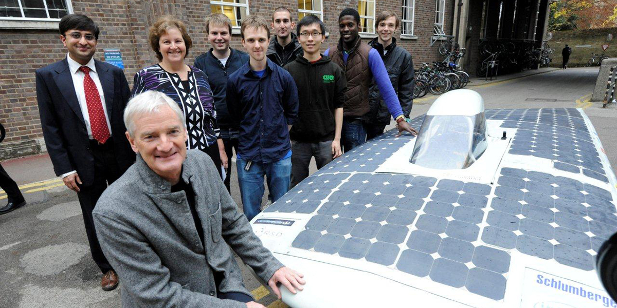 James Dyson with students in the Engineering Department at Cambridge University
