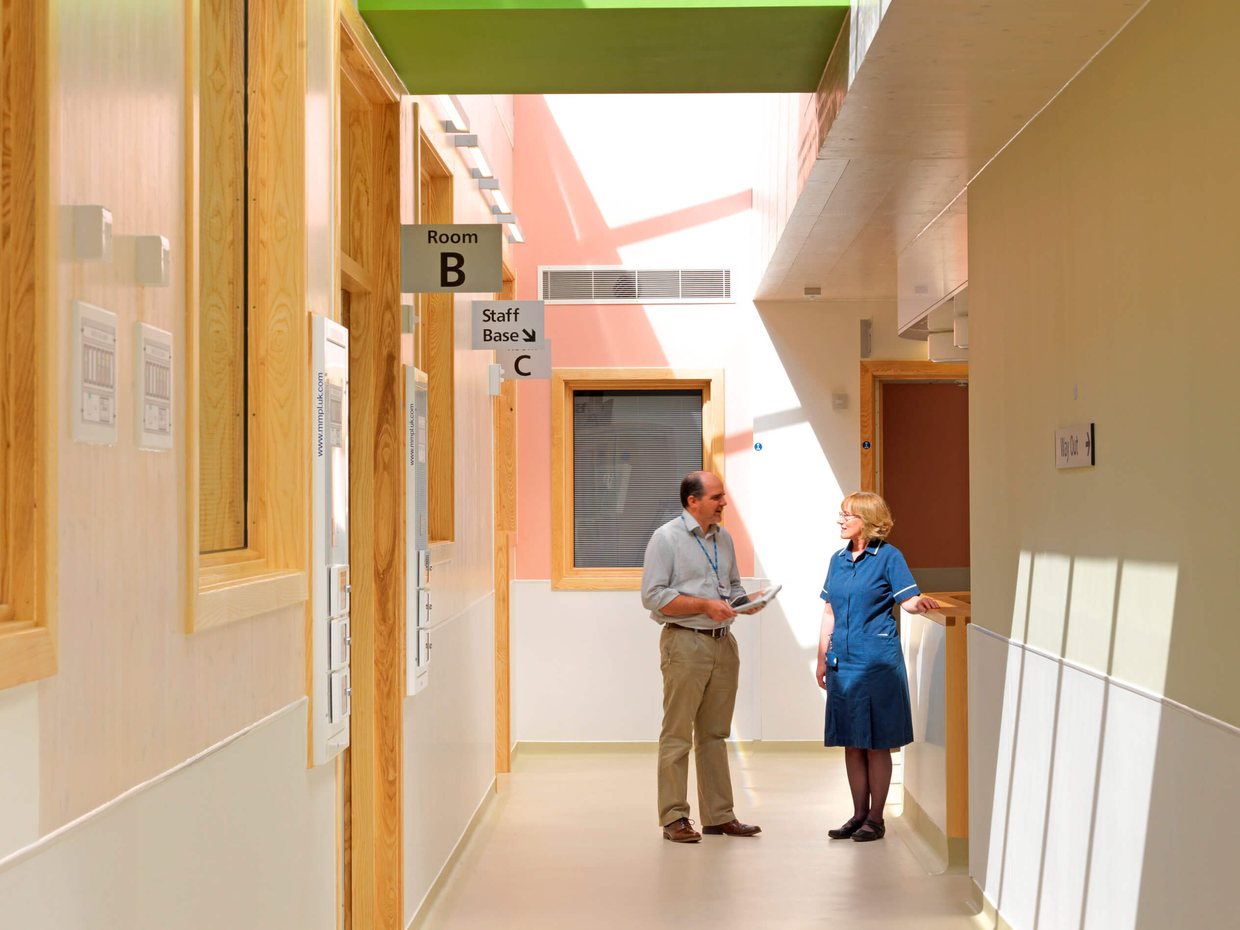 A doctor and nurse having a discussion in the Dyson Centre for Neonatal Care at the Royal United Hospital in Bath.