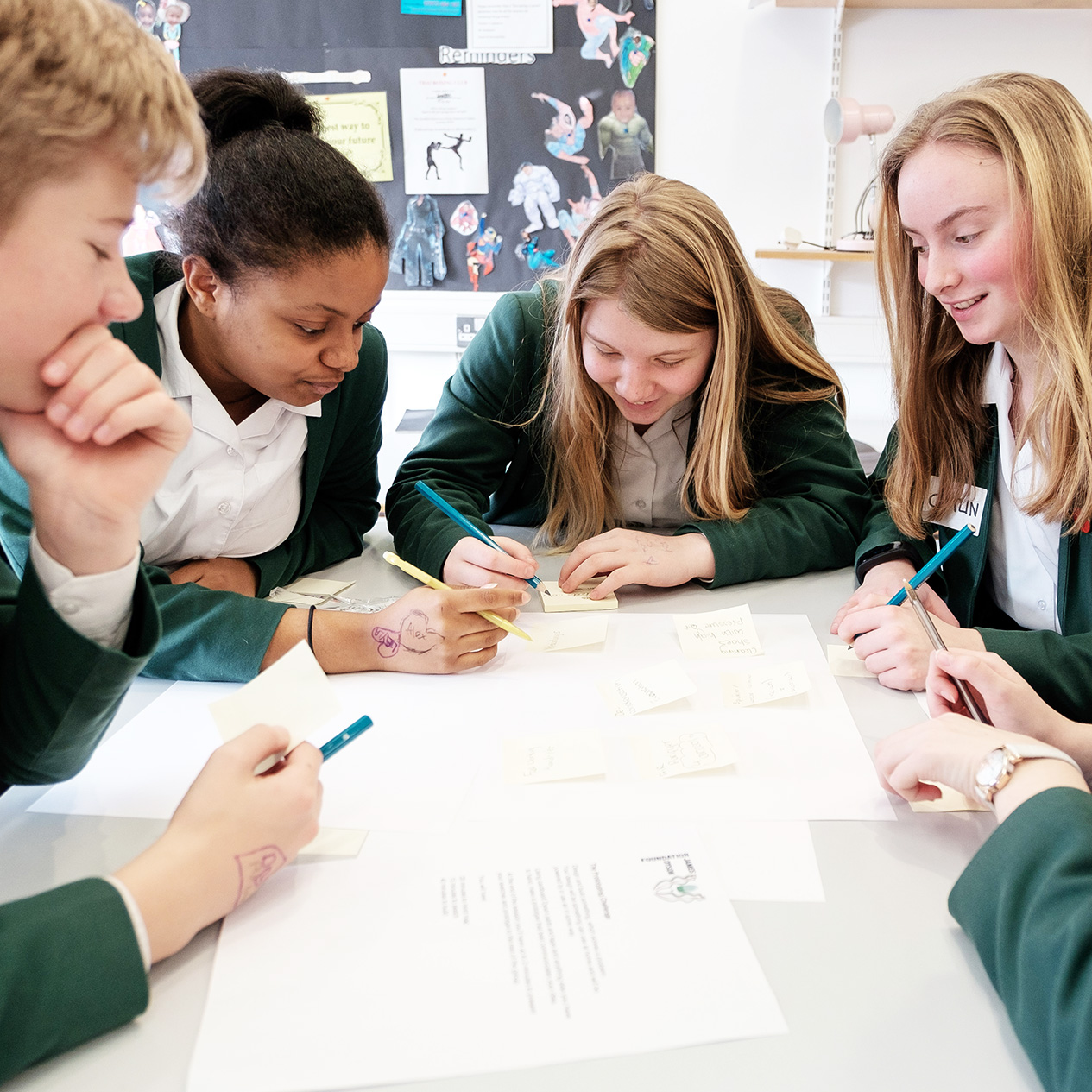 A group of school students sharing ideas during a James Dyson Foundation workshop