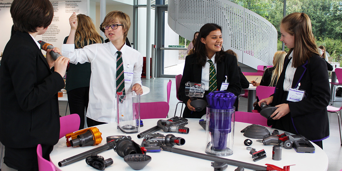 Female students participating in a prototyping workshop at Dyson