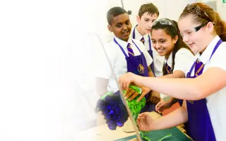 Four students building a prototype.