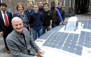 Sir James Dyson and team of engineers outside the University of Cambridge.