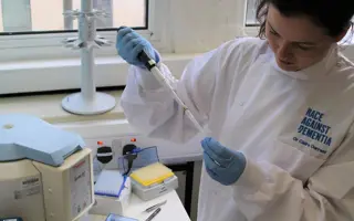 Dr Claire Durrant, from Race Against Dementia, working in a lab.