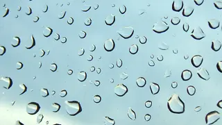 Water droplets on a pane of glass.